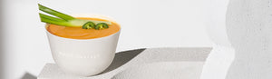 Butternut Squash and Rosemary Puree Soup in a compostable Daily Harvest bowl