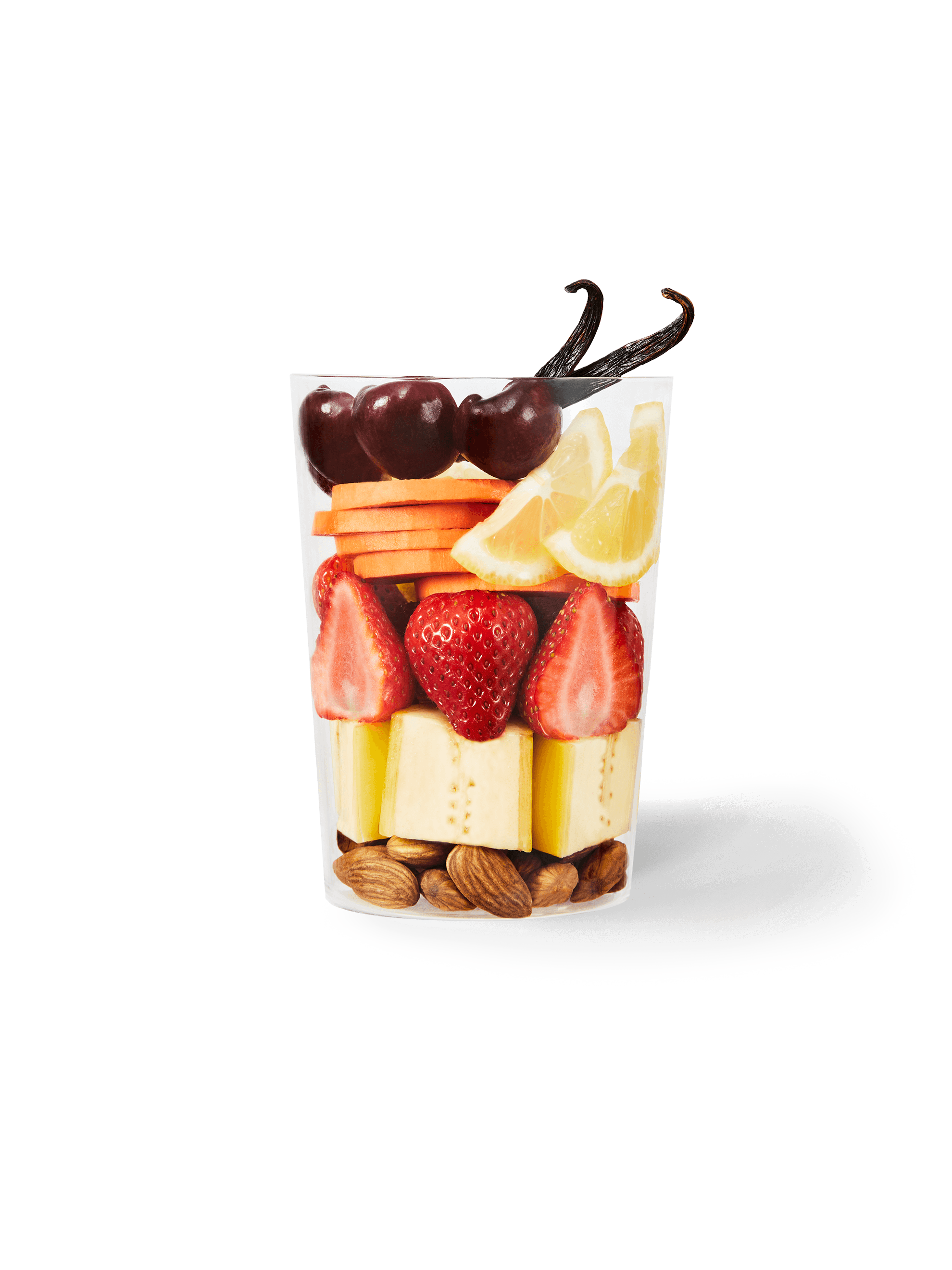 Clear cup filled with the ingredients included in our Cherry + Almond Smoothie