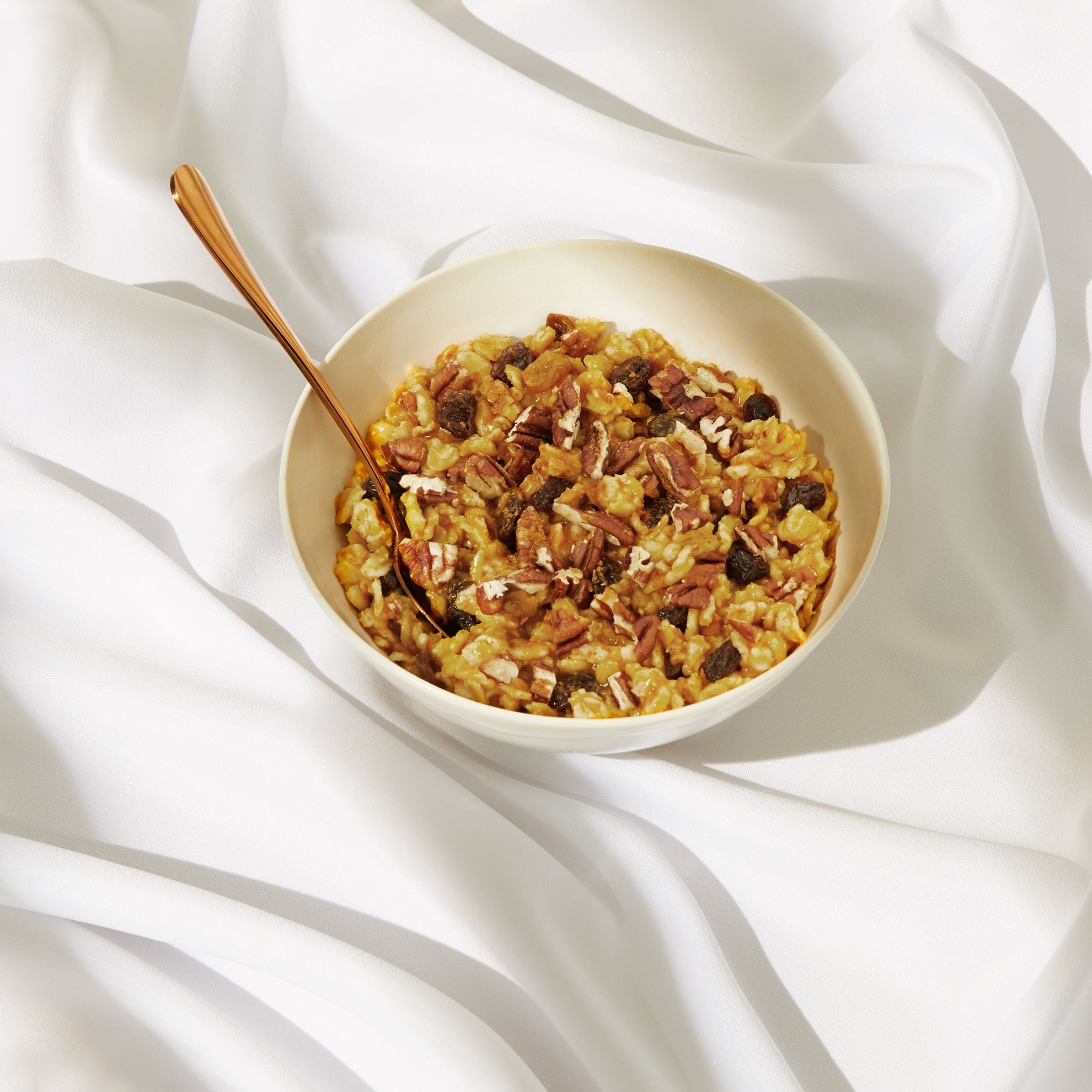 Image of Daily Harvest Kabocha and Chai Oat Bowl prepared in a bowl.