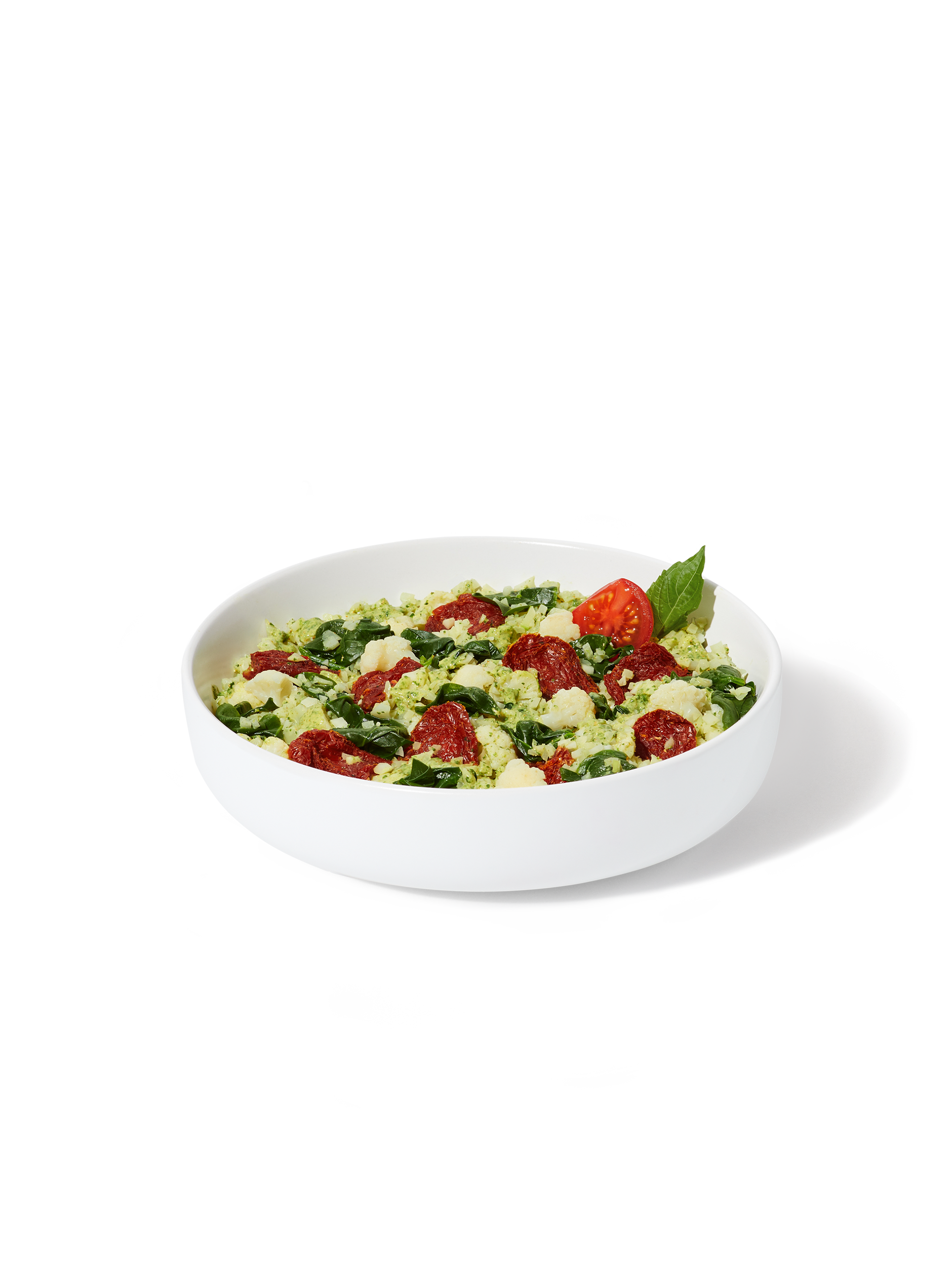 Image of Daily Harvest Cauliflower Rice + Pesto Harvest Bowl prepared in a bowl.