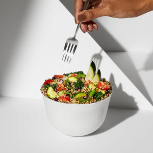 A lifestyle image of a prepared Daily Harvest Quinoa + Chipotle Harvest Bowl in a bowl.