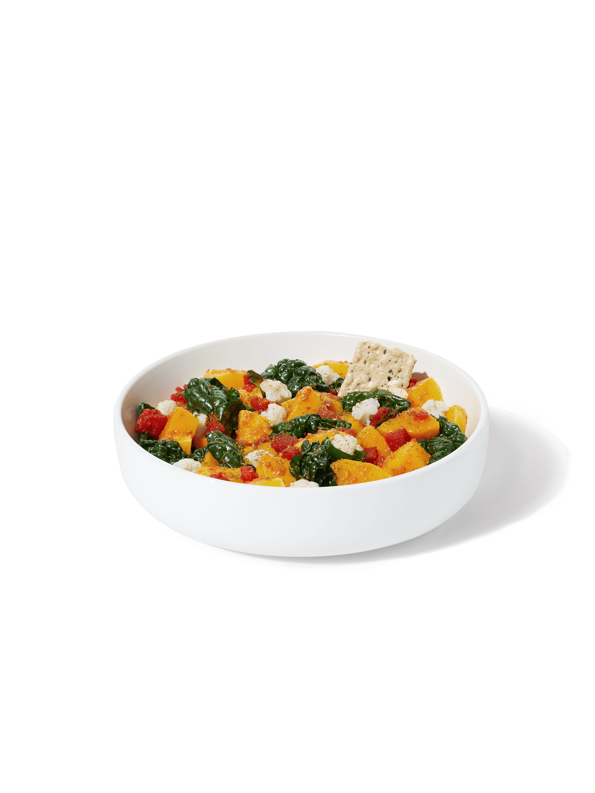Butternut Squash + Kale Shakshuka Harvest Bowl prepared in bowl