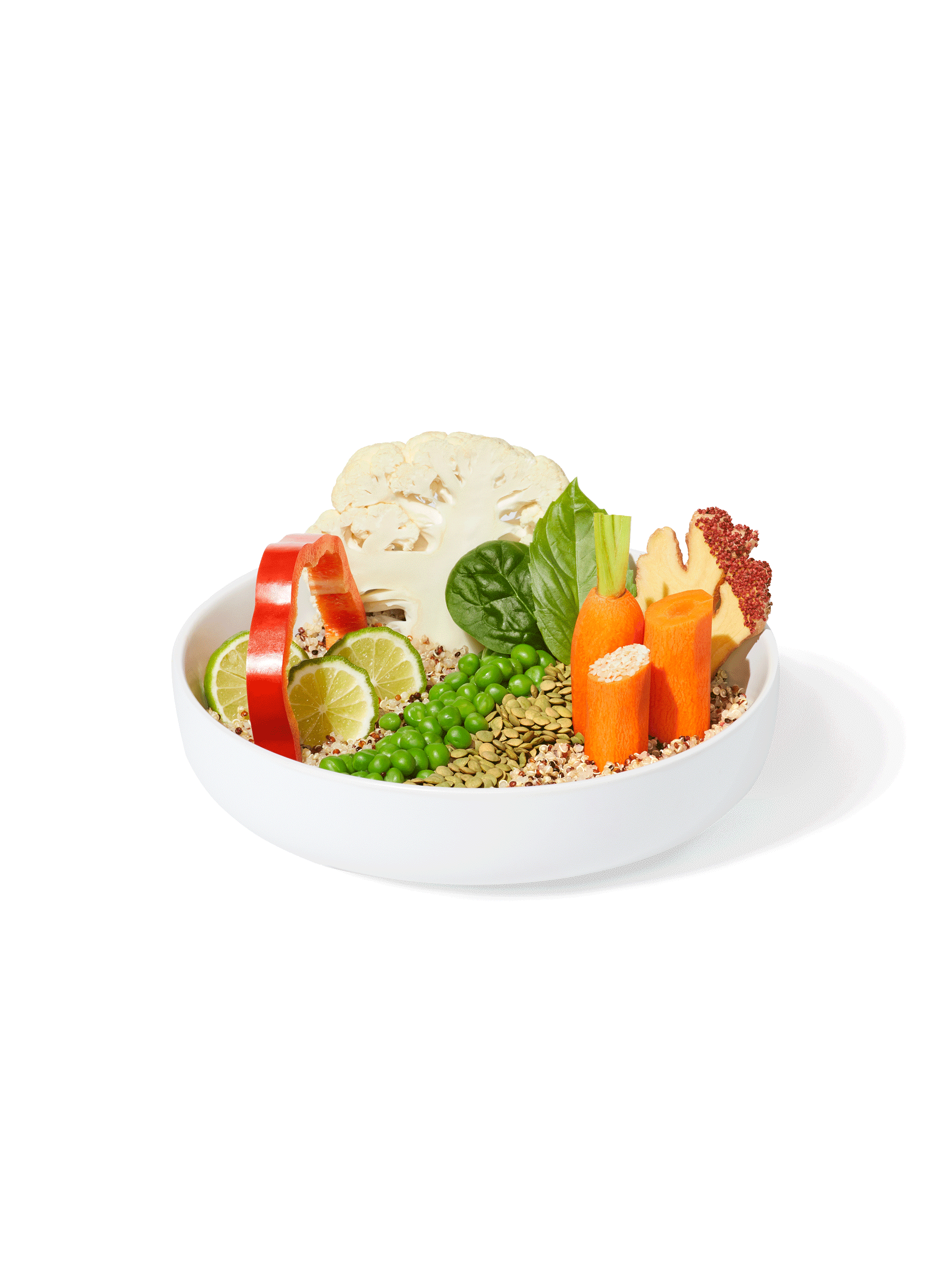A large white bowl filled with ingredients included in a Quinoa + Makrut Lime Harvest Bake.