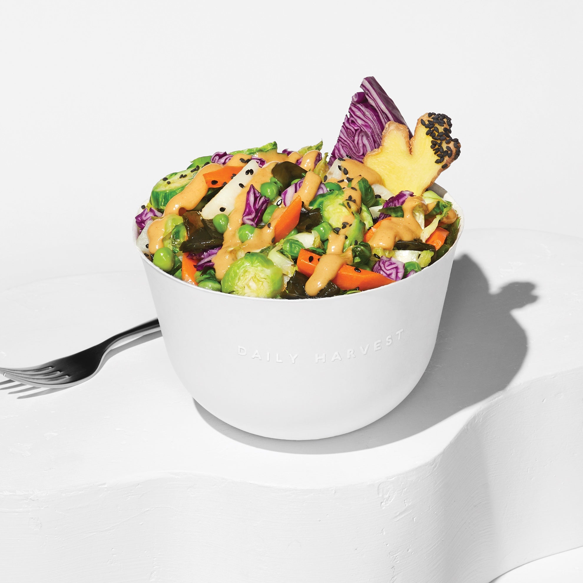 Image of Daily Harvest Brussels Sprouts + Sesame Harvest Bowl prepared and plated.