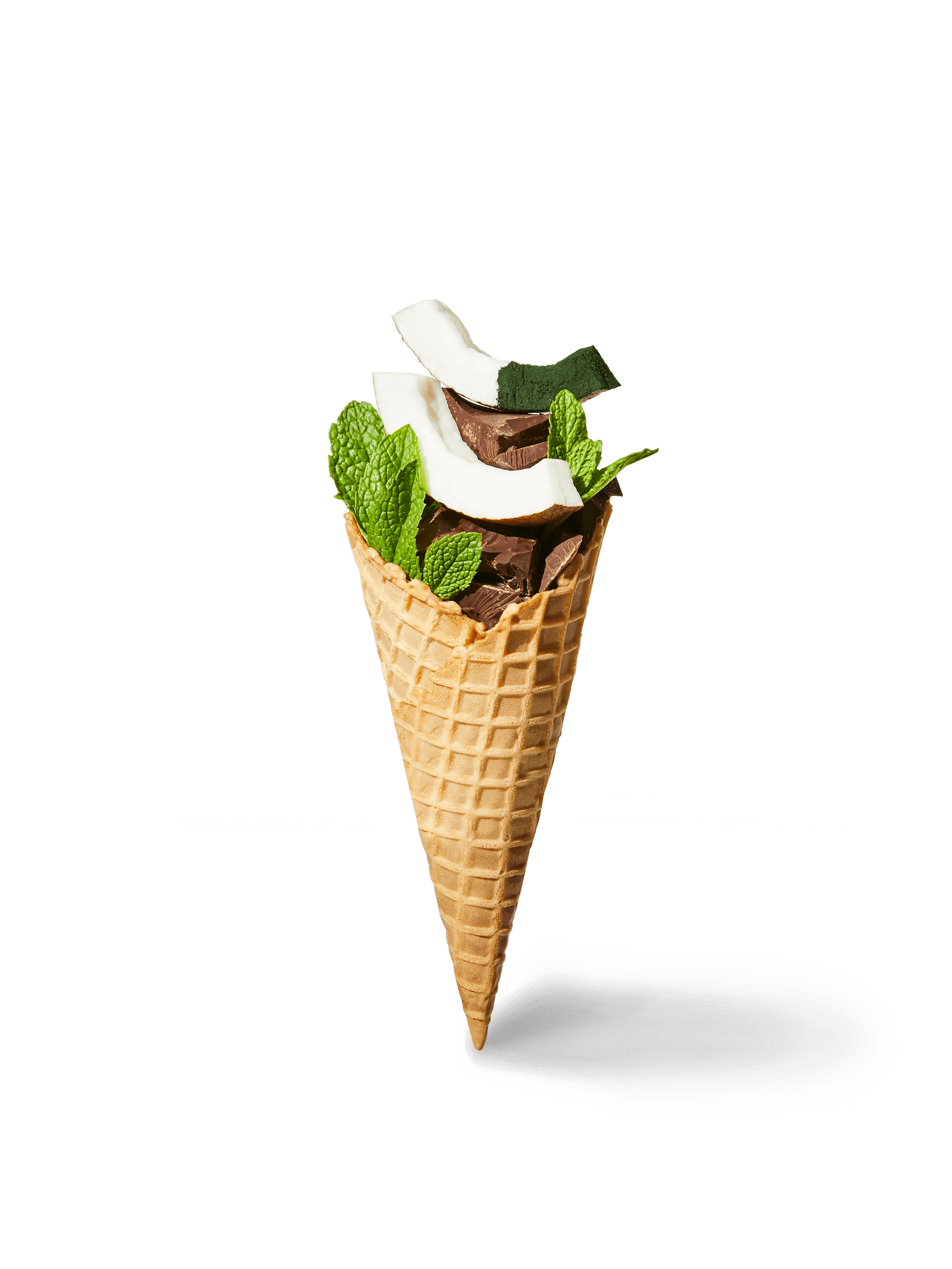 Waffle cone filled with ingredients included in our Mint + Dark, Melty Cacao Chips Scoops