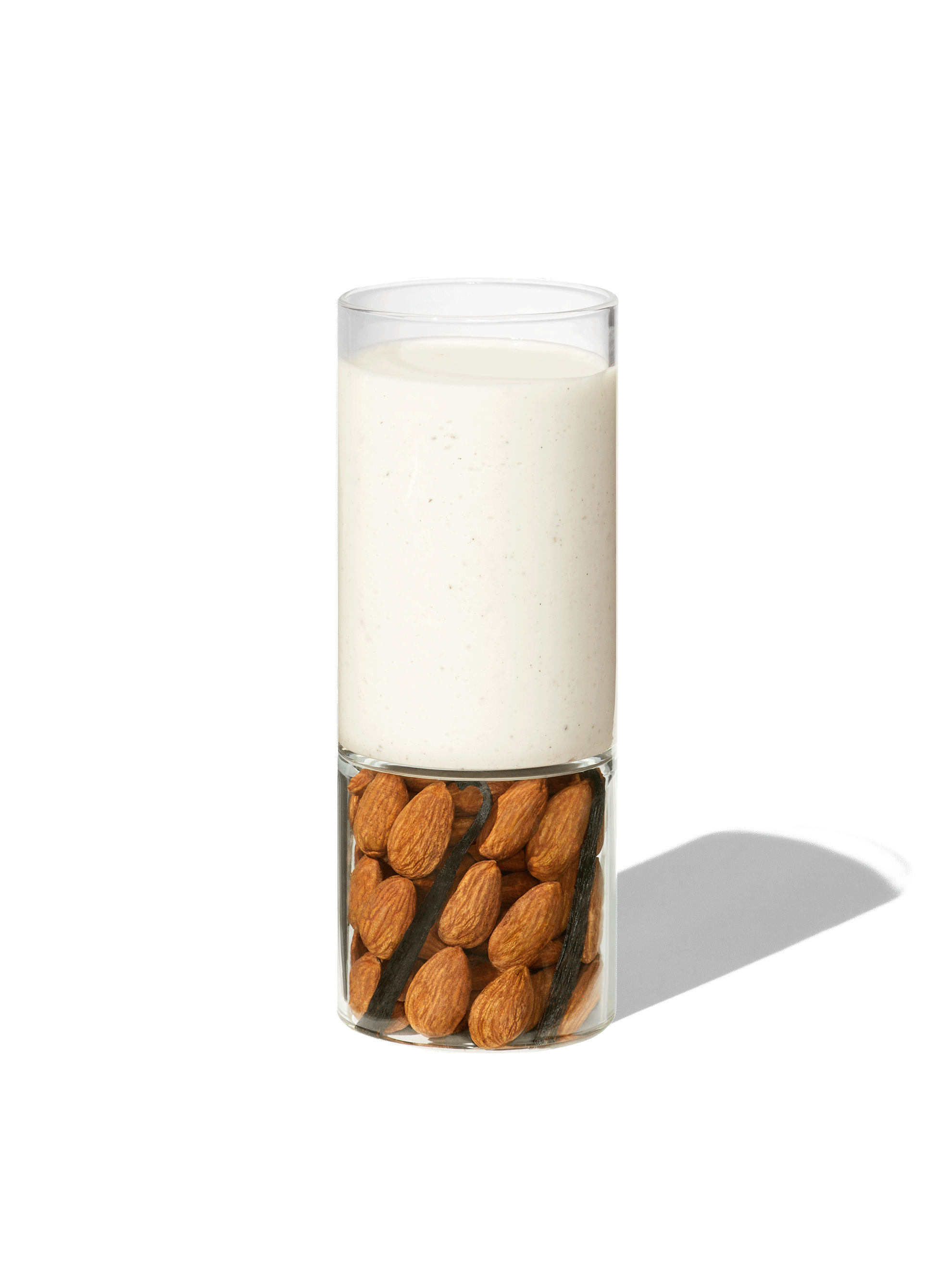 Almonds and vanilla bean in a pitcher