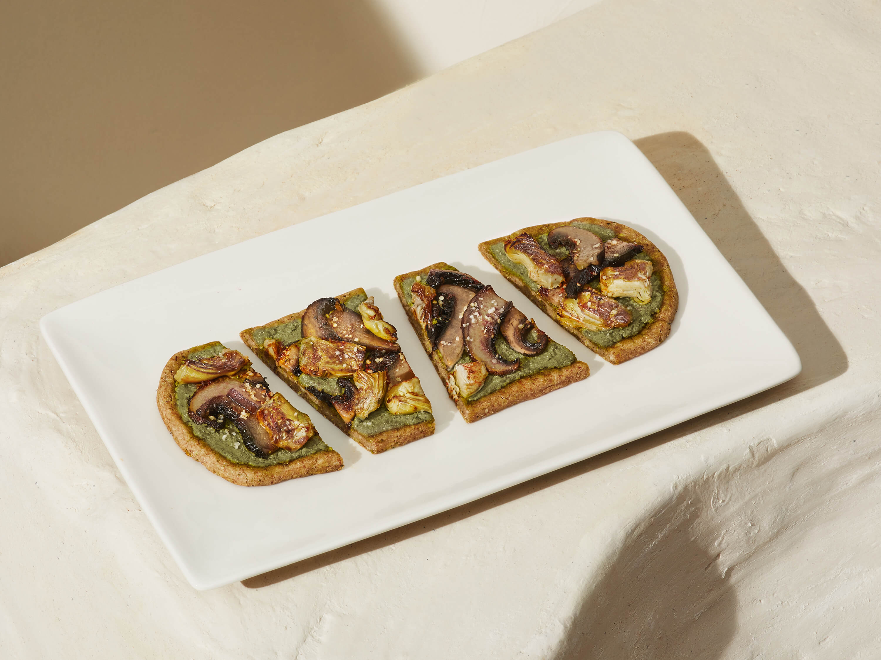 Image of prepared Daily Harvest Portobello + Pesto Flatbread